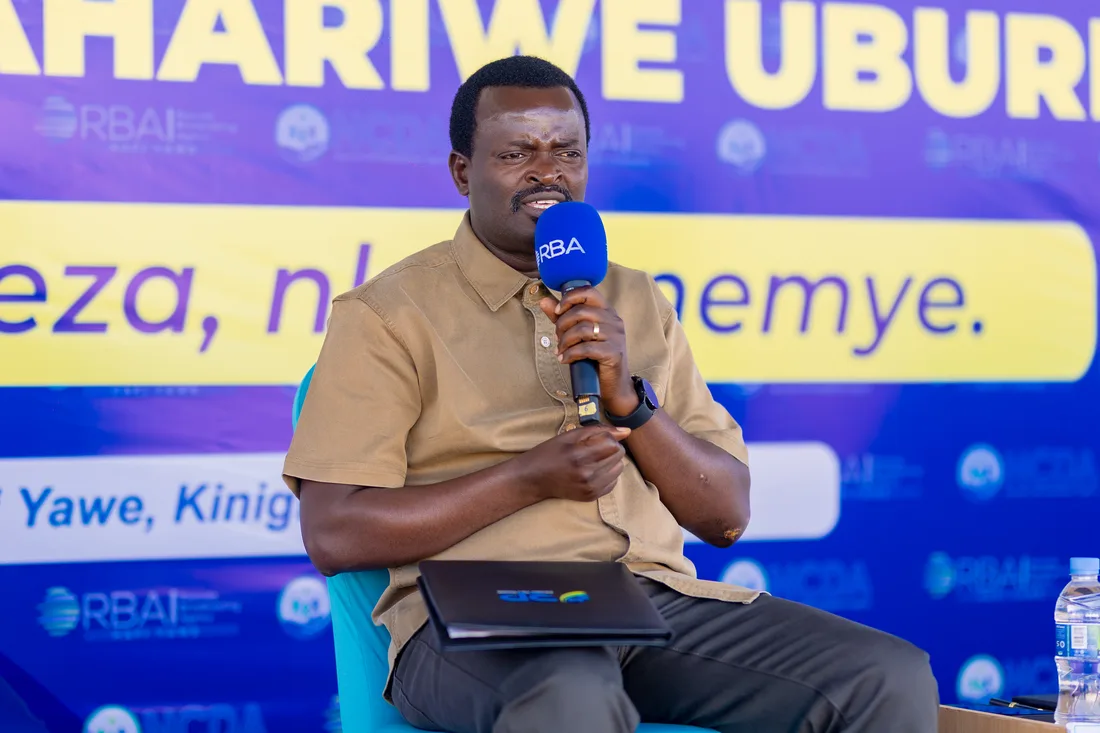 Speaker on stage at the Ukwezi Kw'Abana broadcast event