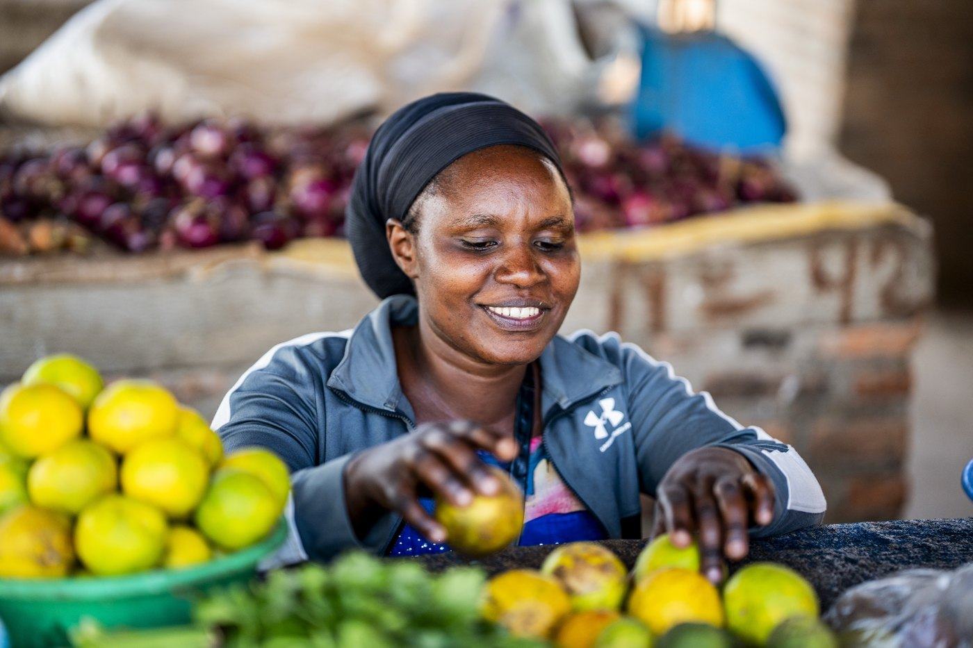 Setting out the day’s fruit at the market