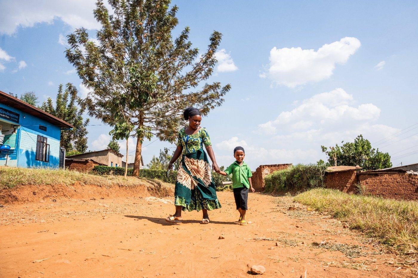 A mother and her child on the road