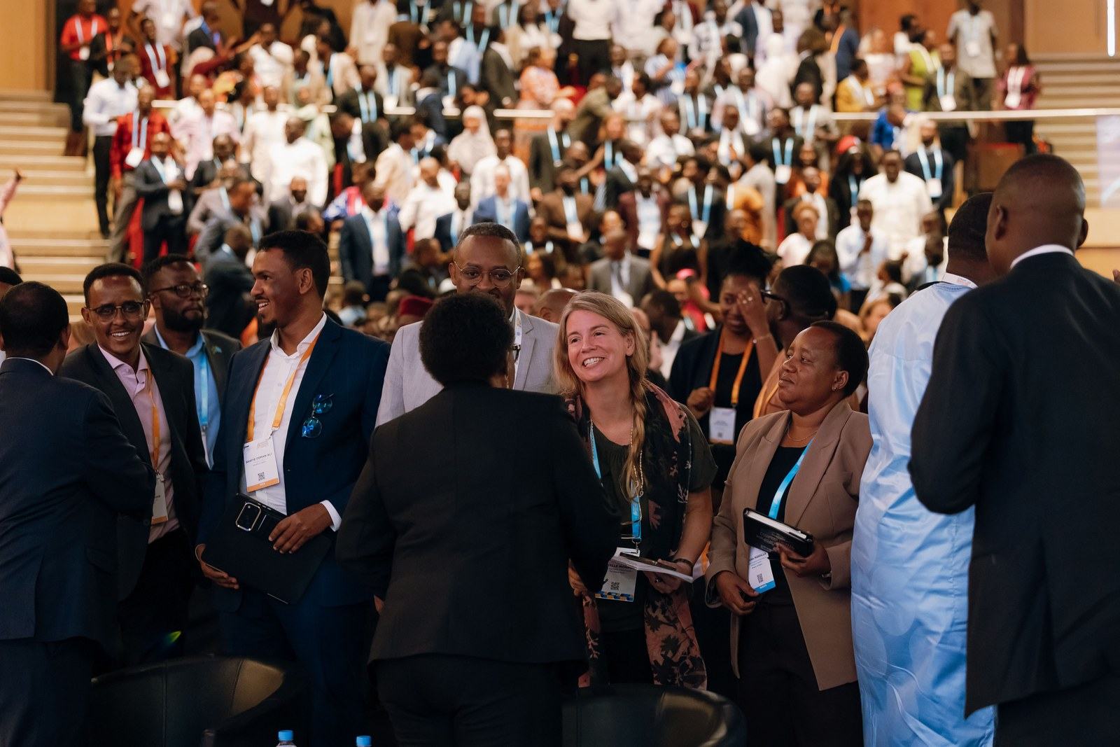 Delegates meet after the plenary
