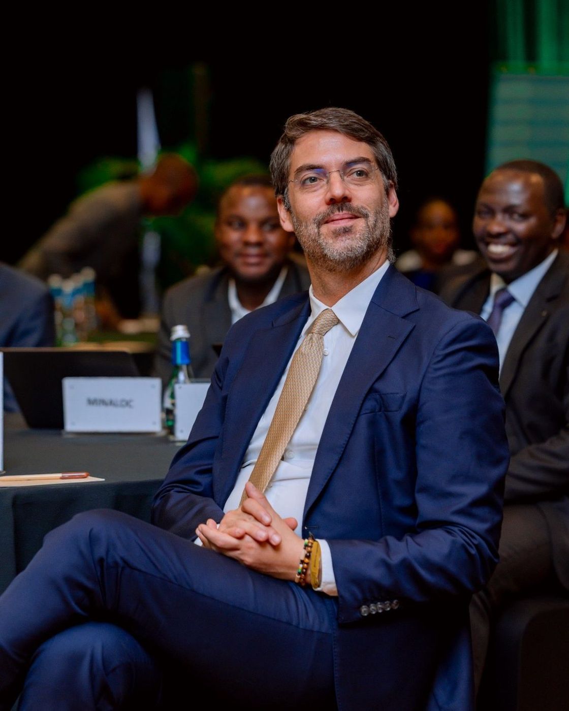 A guest listens during a forum session in Kigali