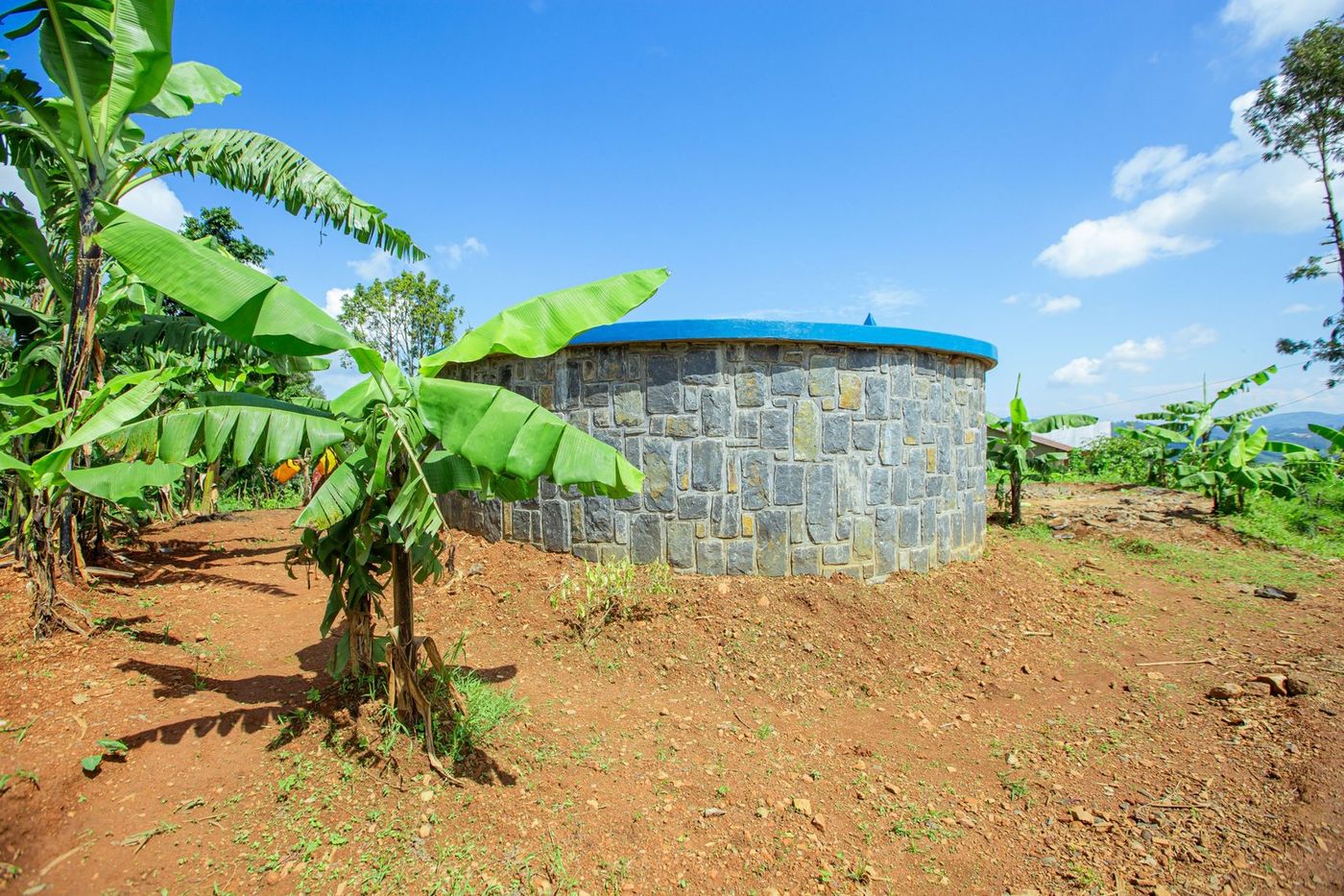 The new stone reservoir among banana plants above Muko