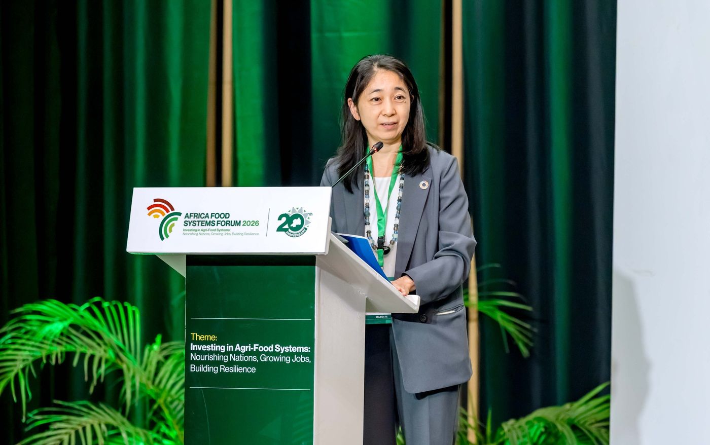 A speaker at the podium of the Africa Food Systems Forum in Kigali